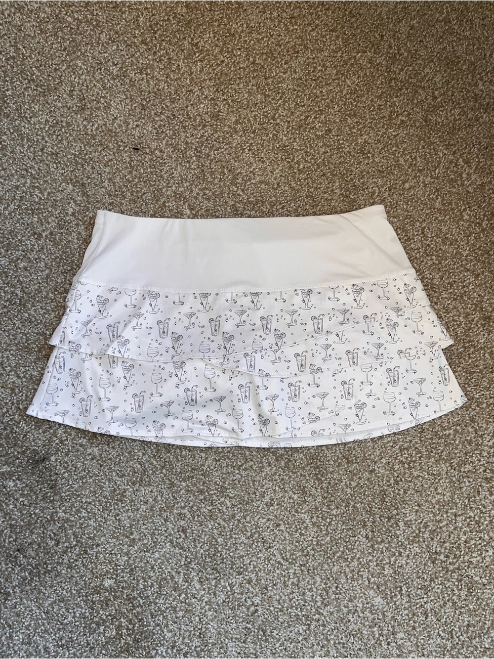 Lucky in Love - White ruffled dry-fit skirt w/ bubbly drinking graphics